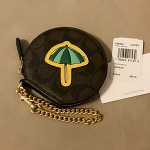 NWT Coach logo round zip pouch with chain and umbrella monogram